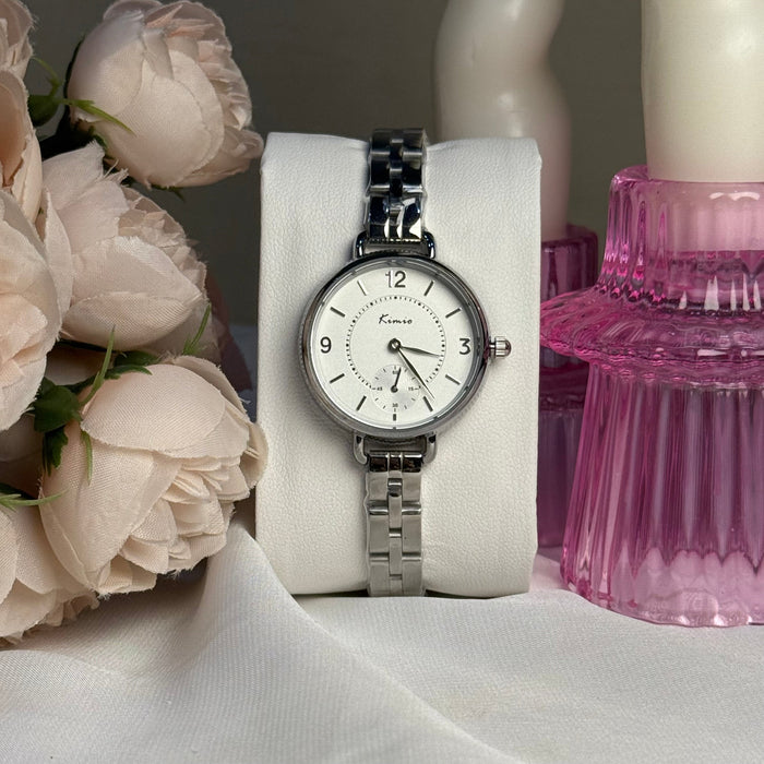 KIMIO watch for ladies with white premium dial and silver chain .